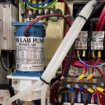 Integrated electromechanical control enclosure with electrical wiring, fluid components, and mechanical assemblies by General Assembly & Manufacturing Corp.
