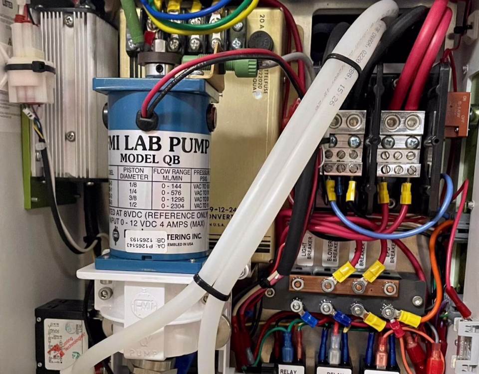 Integrated electromechanical control enclosure with electrical wiring, fluid components, and mechanical assemblies by General Assembly & Manufacturing Corp.